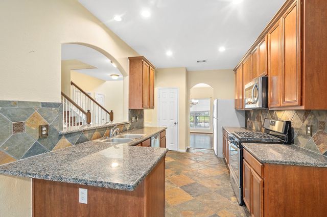 10003 Lynette Falls Drive, Houston, TX 77095