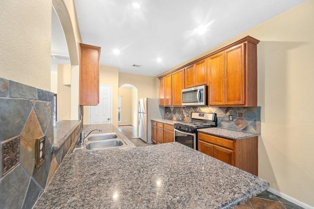 10003 Lynette Falls Drive, Houston, TX 77095