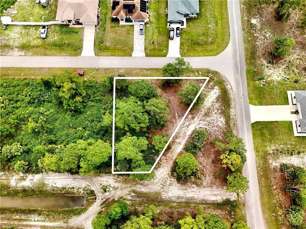 721 Pinecastle DR, LEHIGH ACRES, FL 33974 — exterior