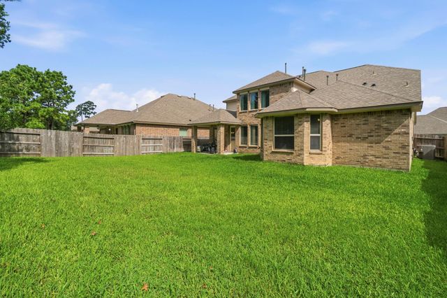30985 Laurel Creek Lane, Conroe, TX 77385