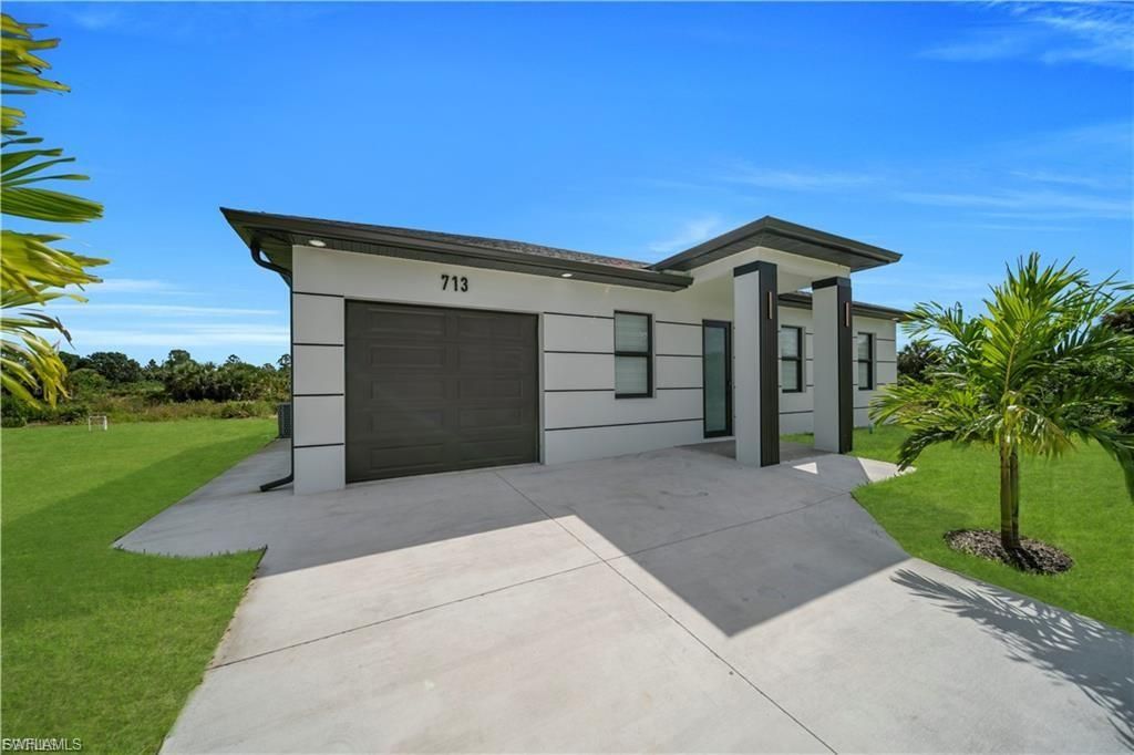 711 Roma AVE S, Lehigh Acres, FL 33974