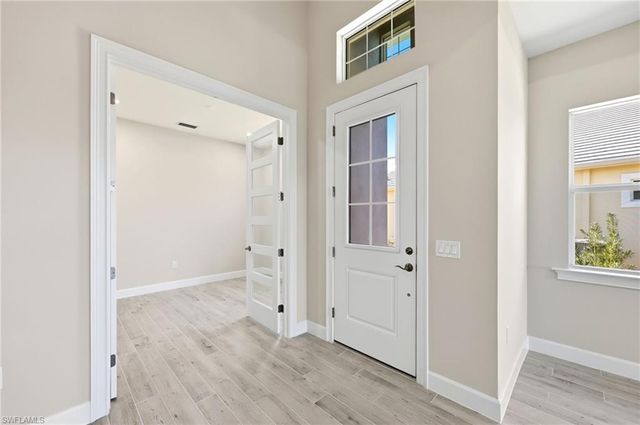 8937 Calypso CT, Naples, FL 34112