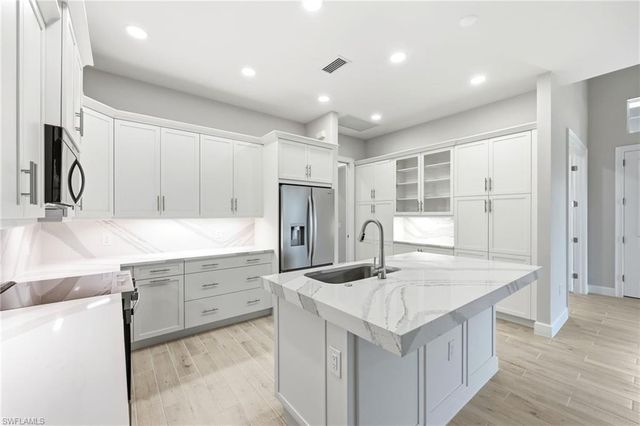 8937 Calypso CT, Naples, FL 34112