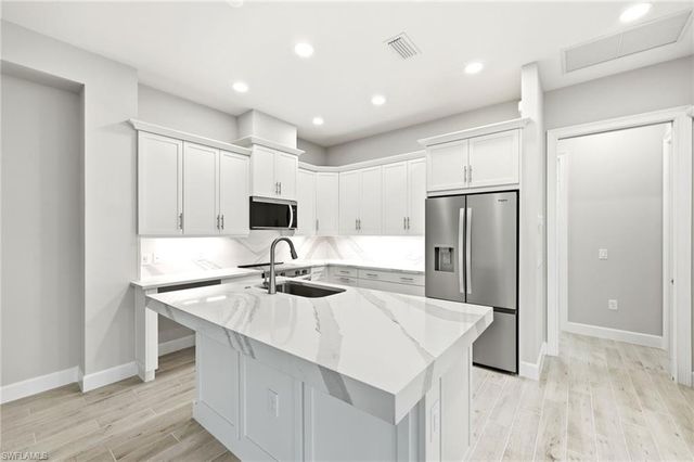 8937 Calypso CT, Naples, FL 34112