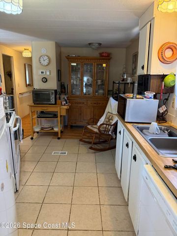 1025 Waterway Drive, Barefoot Bay, FL 32976