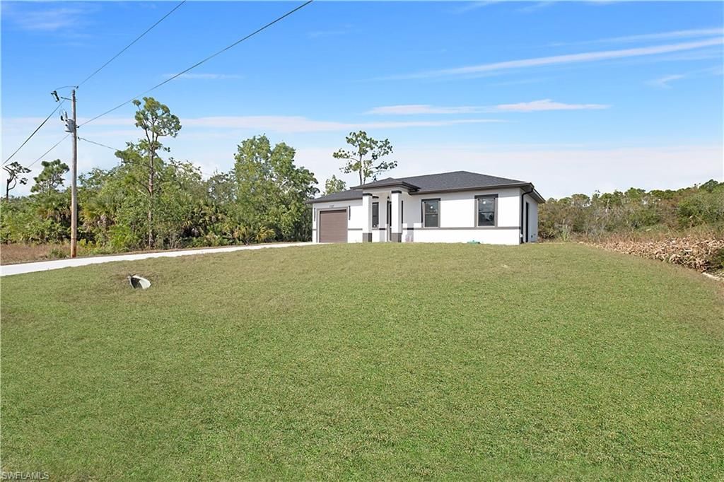 1127 Rachel ST E, LEHIGH ACRES, FL 33974 — photo 2