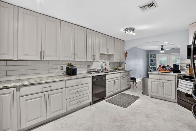 9861 Fairway Cove Lane, Plantation, FL 33324