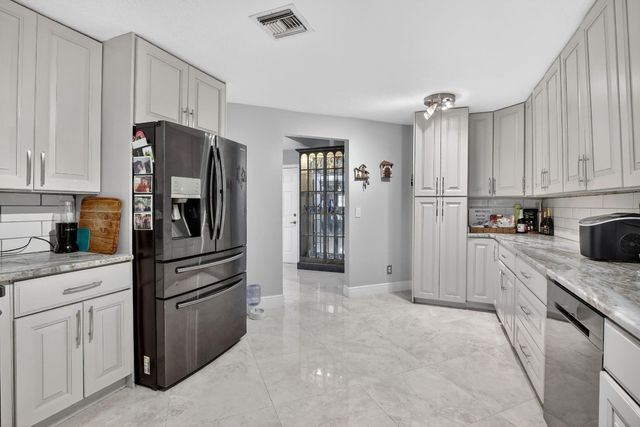 9861 Fairway Cove Lane, Plantation, FL 33324