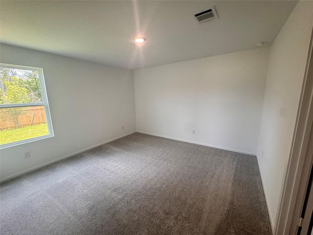 25668 Rose Creek Drive, Cleveland, TX 77328