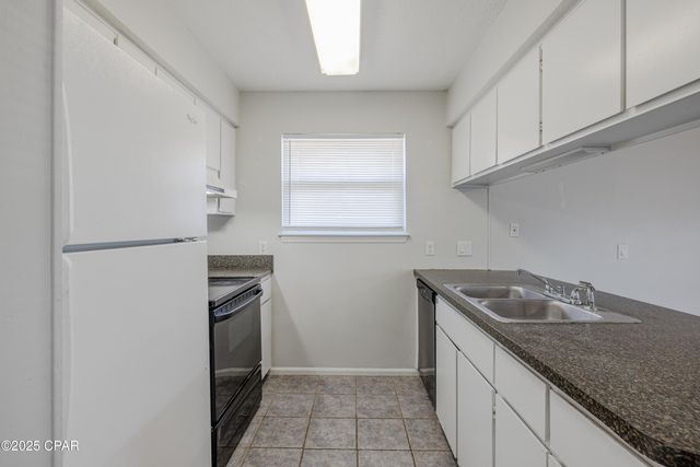 7813 N Lagoon Drive 4H, Panama City Beach, FL 32408