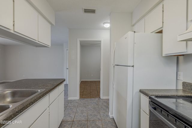 7813 N Lagoon Drive 4H, Panama City Beach, FL 32408