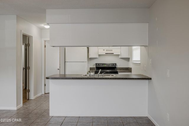 7813 N Lagoon Drive 4H, Panama City Beach, FL 32408