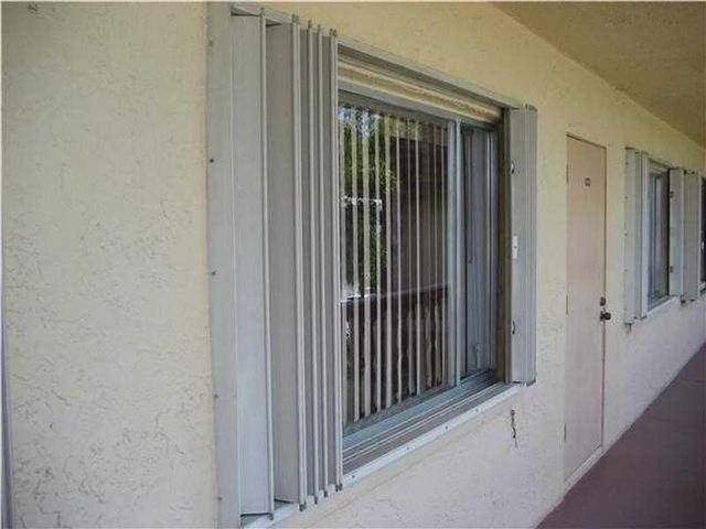 500 VILLAGE GREEN Circle W 107, Palm Springs, FL 33461