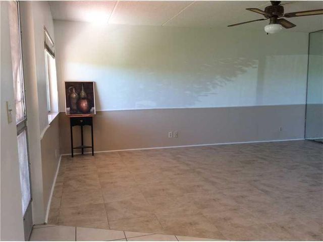 500 VILLAGE GREEN Circle W 107, Palm Springs, FL 33461