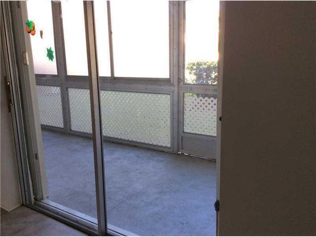 500 VILLAGE GREEN Circle W 107, Palm Springs, FL 33461