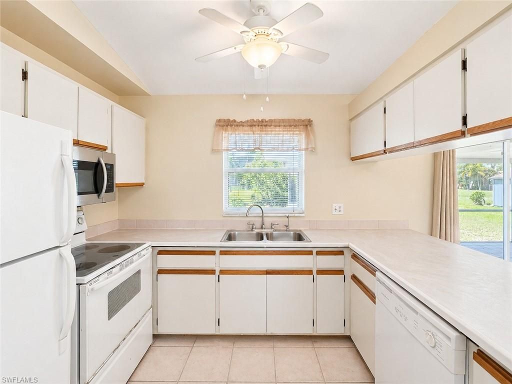 Image 3 of property listing at 1412 10th ST, Cape Coral, FL 33993