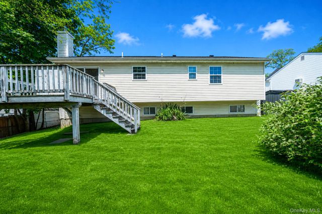 57 Woodycrest Drive, Farmingville, NY 11738