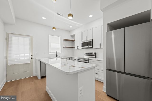 126 N MOUNT ST, Baltimore, MD 21223