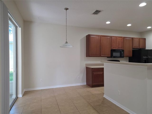 311 RAMBLING CIRCLE, Apopka, FL 32712