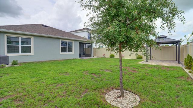 31899 OYSTER TRELLIS LANE, Wesley Chapel, FL 33545