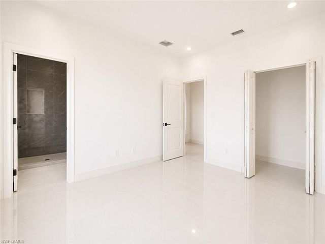 703 Long Island ST E, Lehigh Acres, FL 33974