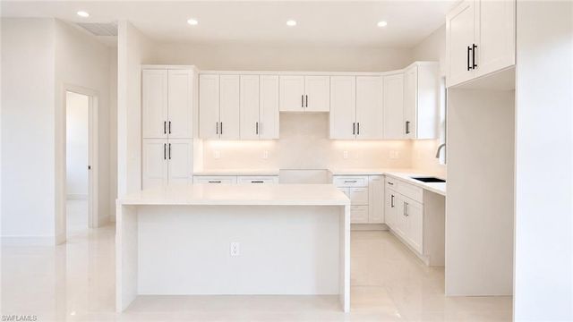703 Long Island ST E, Lehigh Acres, FL 33974