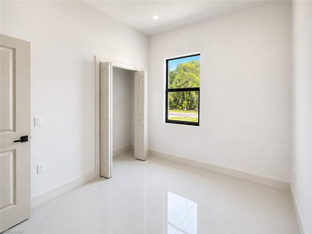 703 Long Island ST E, Lehigh Acres, FL 33974