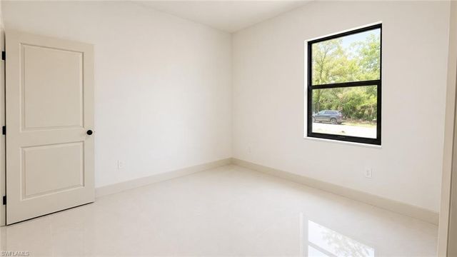 703 Long Island ST E, Lehigh Acres, FL 33974