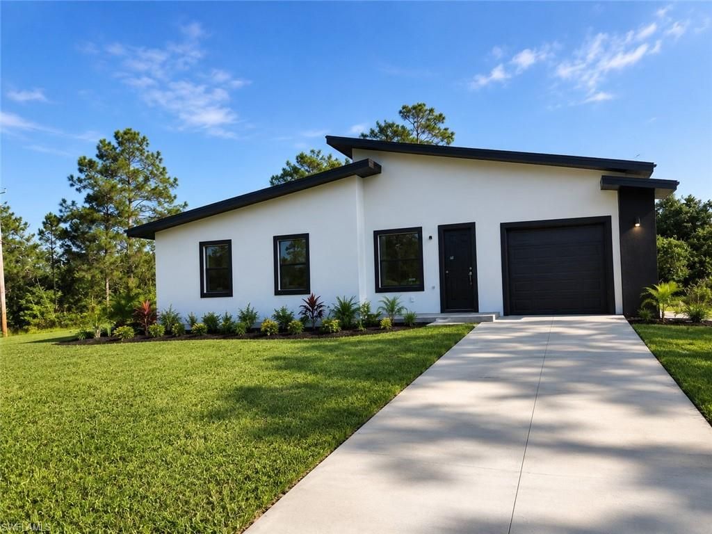 703 Long Island ST E, LEHIGH ACRES, FL 33974 — photo 2