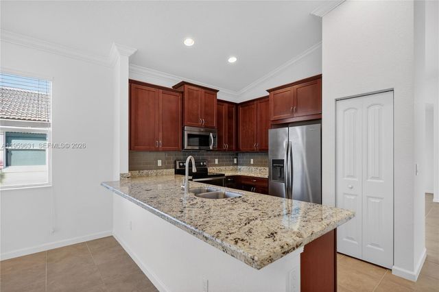 4830 Foxtail Palm Ct, Green Acres, FL 33463