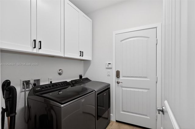 4830 Foxtail Palm Ct, Green Acres, FL 33463