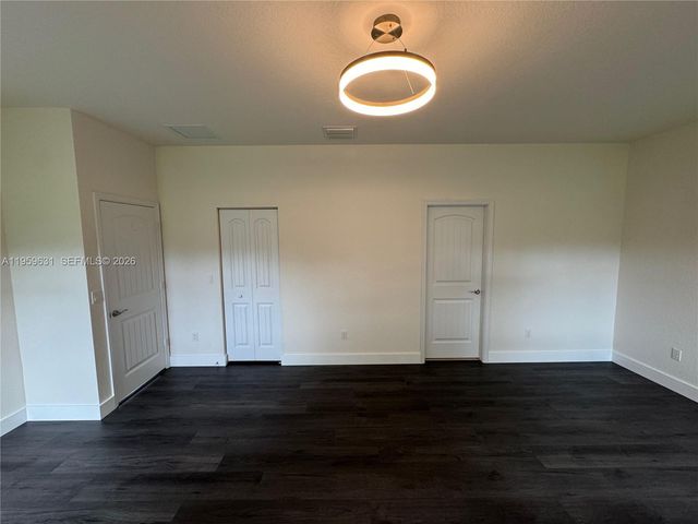 4830 Foxtail Palm Ct, Green Acres, FL 33463