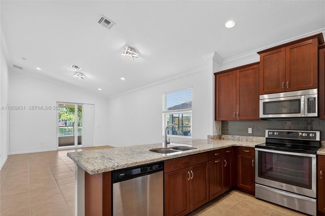 4830 Foxtail Palm Ct, Green Acres, FL 33463