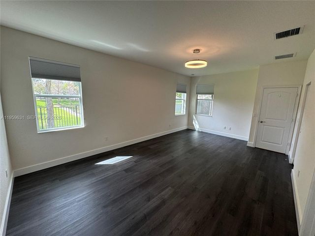 4830 Foxtail Palm Ct, Green Acres, FL 33463