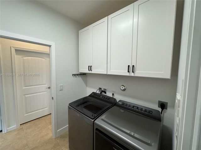 4830 Foxtail Palm Ct, Green Acres, FL 33463