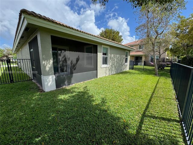 4830 Foxtail Palm Ct, Green Acres, FL 33463