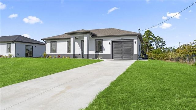 1143 BARFIELD STREET E, Lehigh Acres, FL 33974