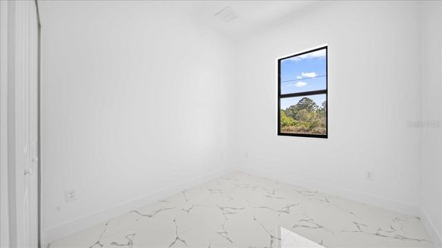 1143 BARFIELD STREET E, Lehigh Acres, FL 33974