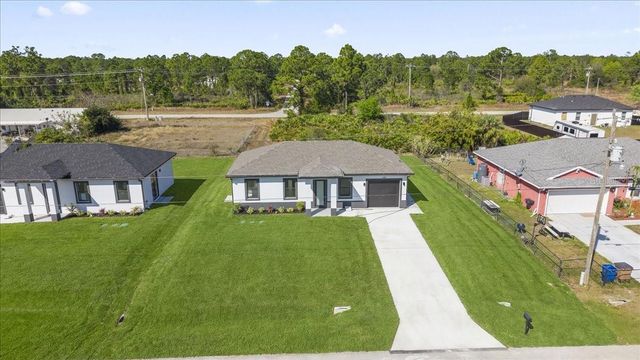 1143 BARFIELD STREET E, Lehigh Acres, FL 33974