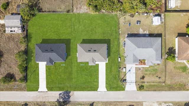 1143 BARFIELD STREET E, Lehigh Acres, FL 33974