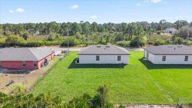 1143 BARFIELD STREET E, Lehigh Acres, FL 33974