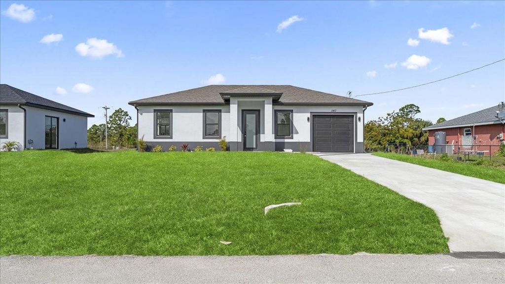 1143 BARFIELD STREET E, Lehigh Acres, FL 33974