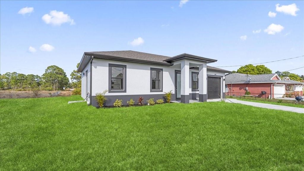 Image 2 of property listing at 1143 BARFIELD STREET E, Lehigh Acres, FL 33974