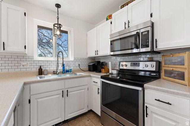 5080 S LEWIS CLARK CIR, Kearns, UT 84118