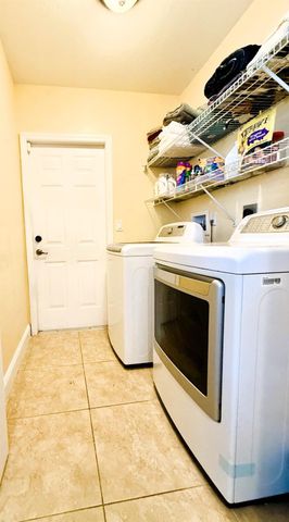 1561 SW Gadsan Avenue, Port St Lucie, FL 34953