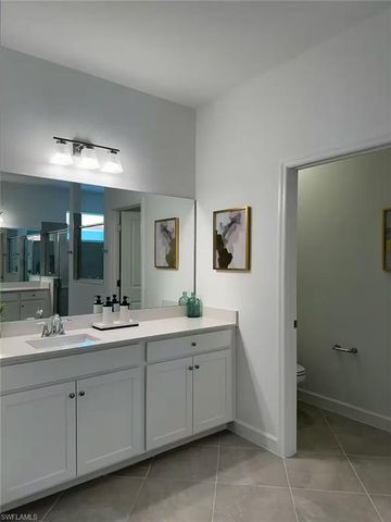 9291 Aqua Overlook CT, Lehigh Acres, FL 33936
