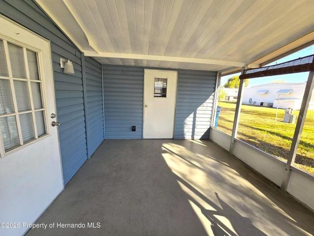7338 FIRST LOOP AVENUE, Brooksville, FL 34613