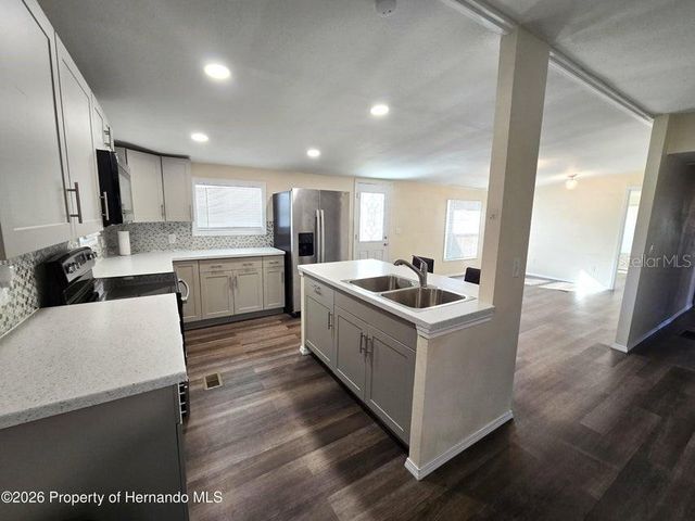 7338 FIRST LOOP AVENUE, Brooksville, FL 34613