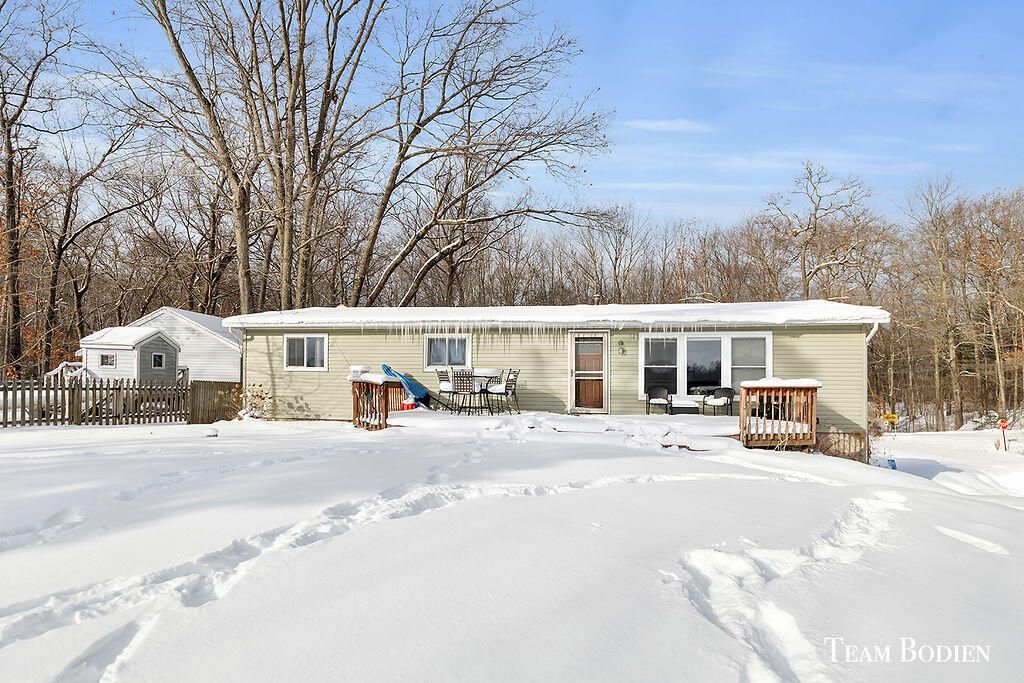 3749 N Bass Lake Road, Pierson, MI 49339