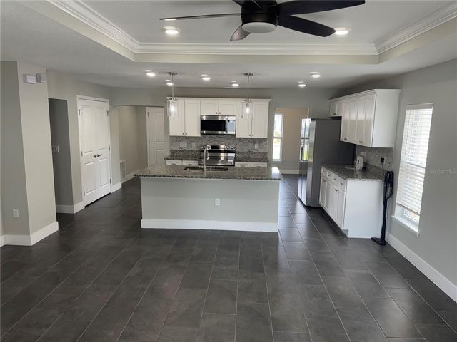 8544 BLACKBERRY AVENUE, Orlando, FL 32825